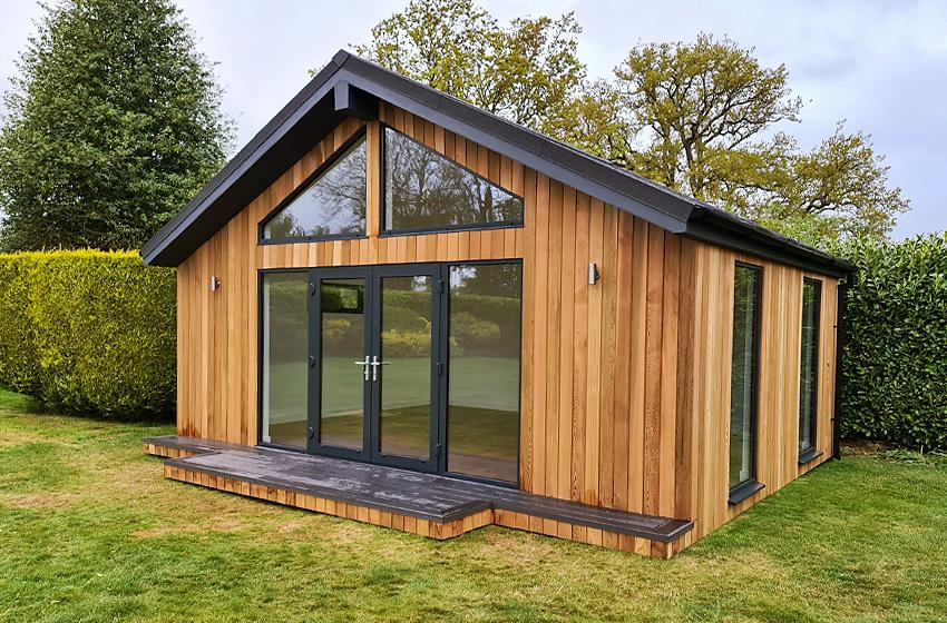 4x4 metre log cabin garden room with large windows