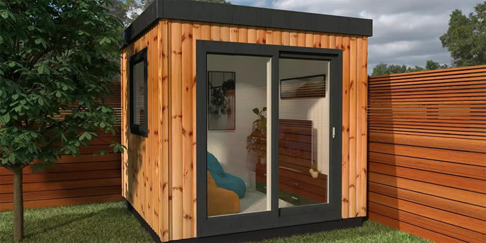 Small log cabin with large glazed frontage