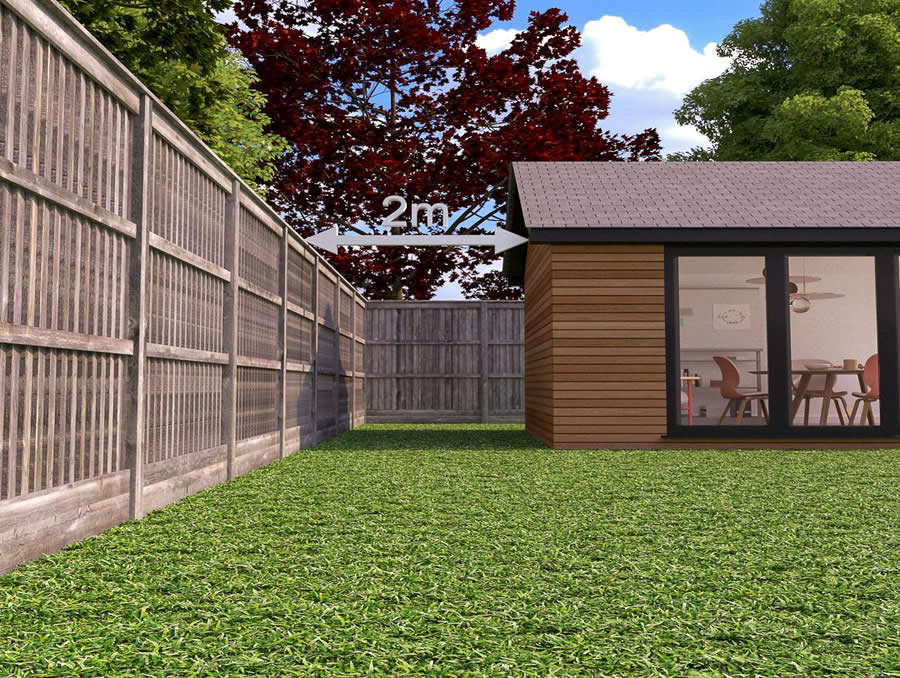 Large garden cabin positioned close to a boundary fence