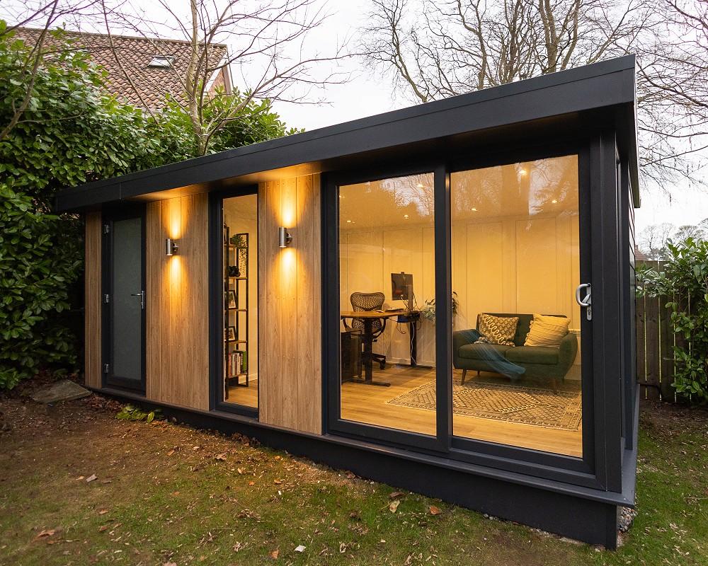Contemporary cabin office overlooking a garden