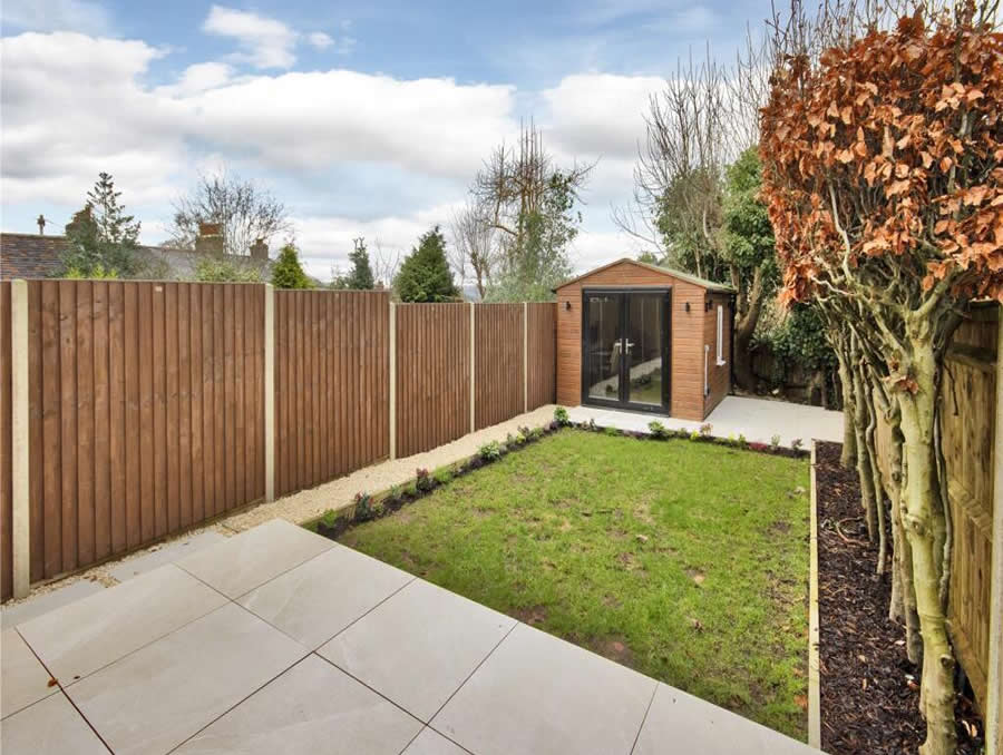 Strategic positioning of a multi-room cabin in a garden