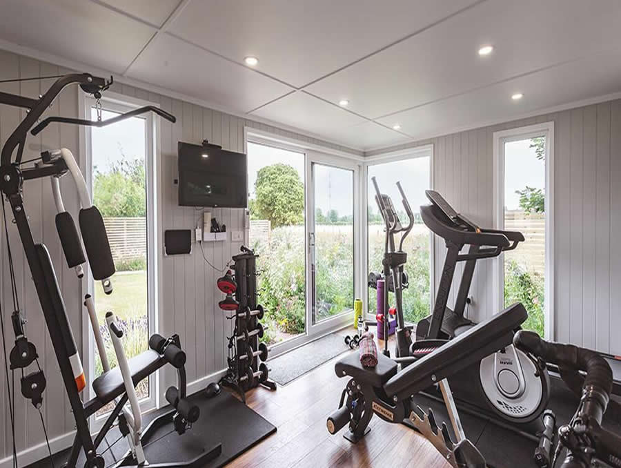 Home gym located beside a garden office