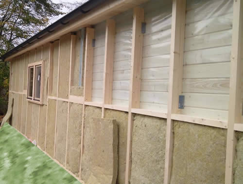 Showing stud work ready to accept insulation