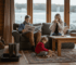 Family relaxing inside insulated log cabin