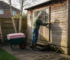 Man inspecting insulated garden cabin in UK